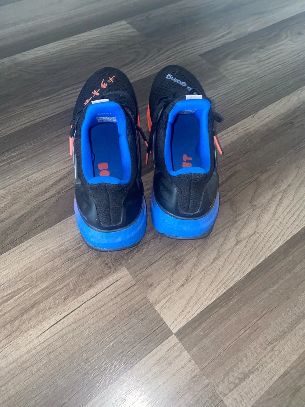 adidas Ultraboost men/women KEEP GOING Black Sneakers Blue and Orange Accents